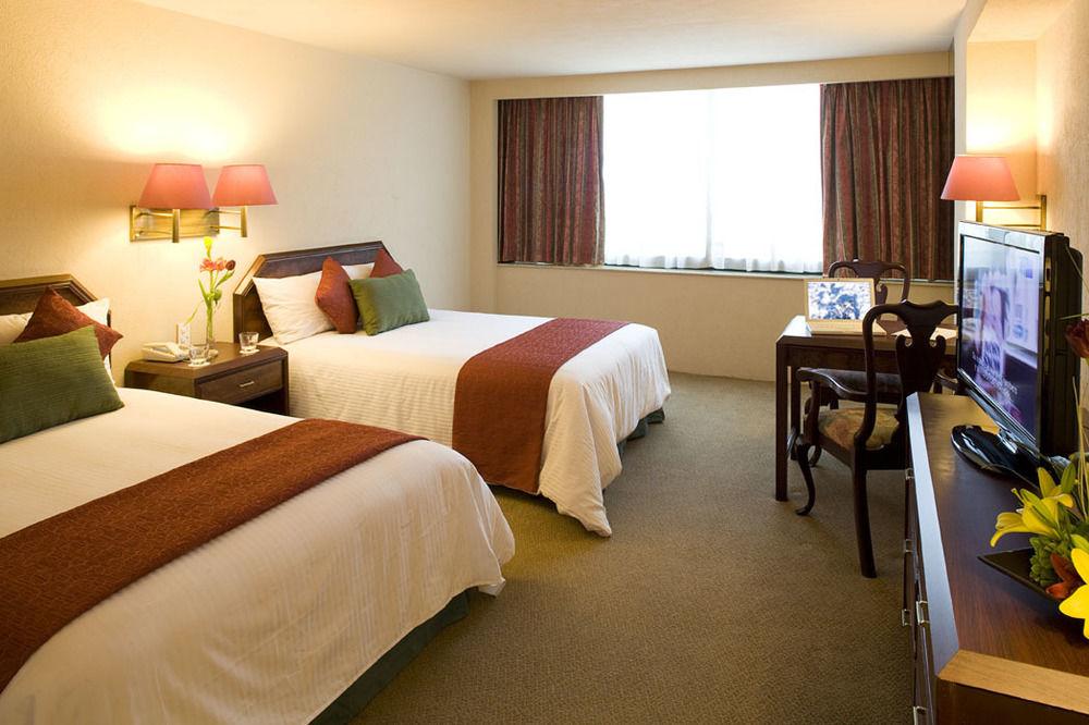 La Joya Pachuca Hotel Bagian luar foto A typical room at the hotel