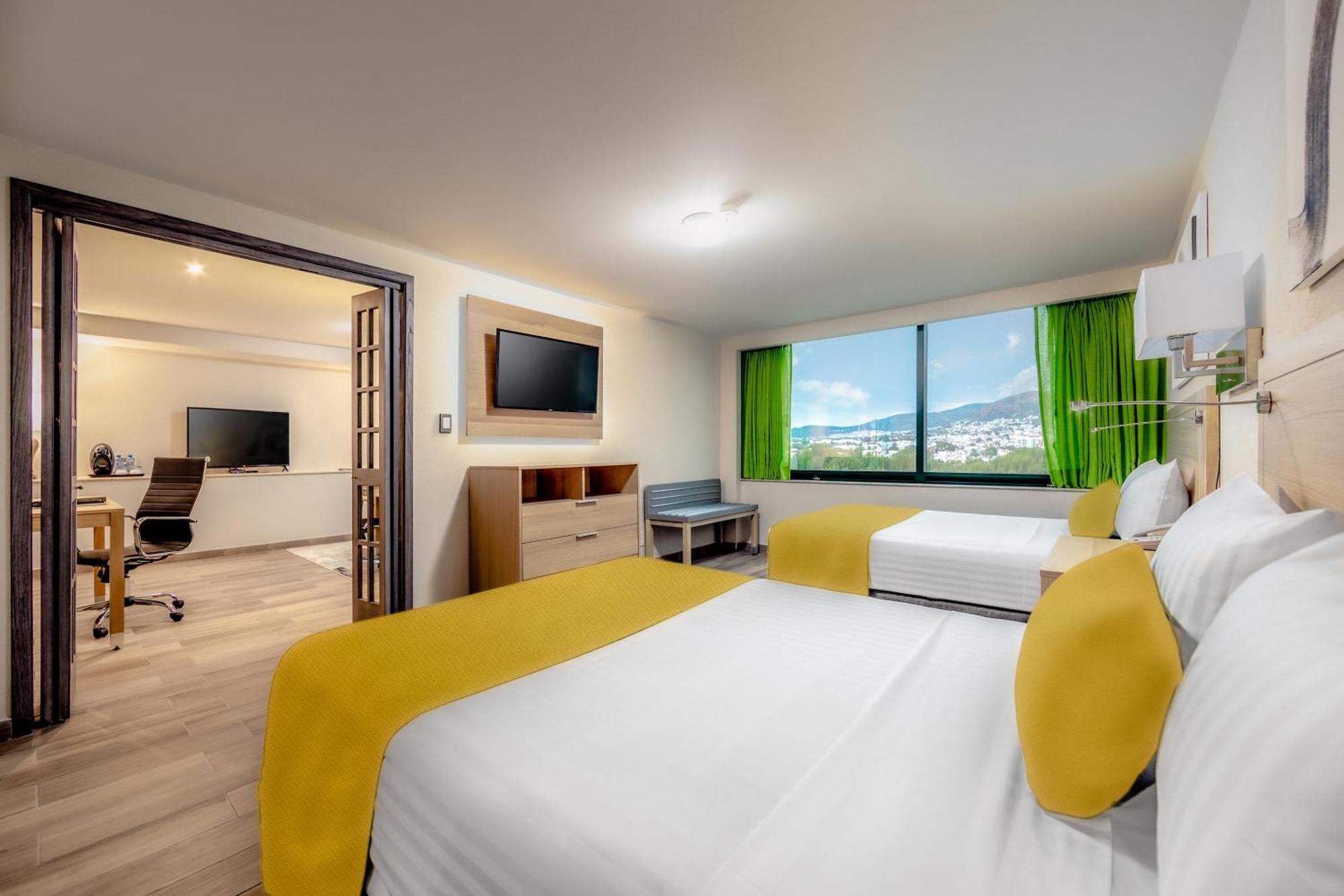 La Joya Pachuca Hotel Bagian luar foto A typical room at the hotel
