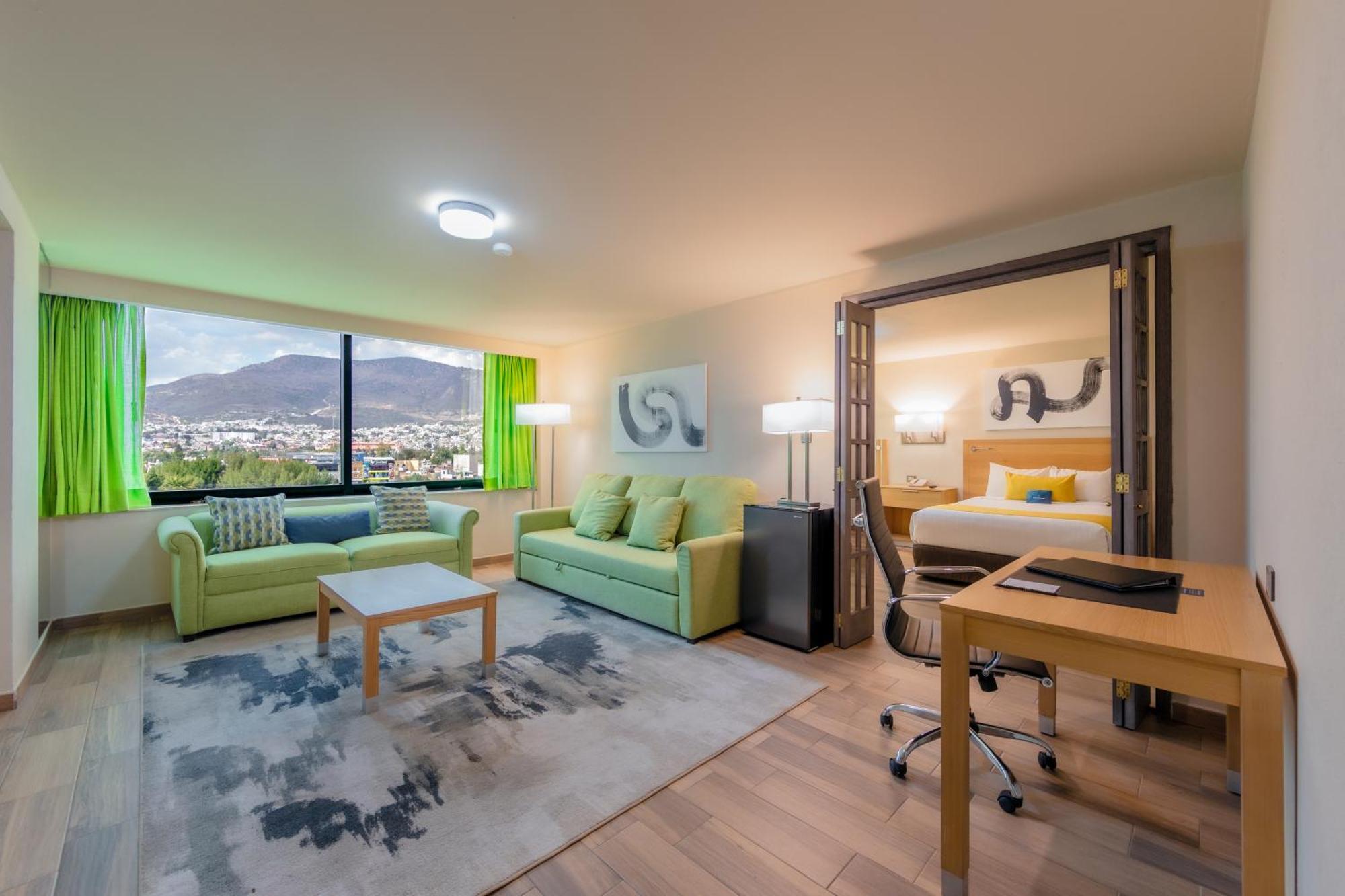 La Joya Pachuca Hotel Bagian luar foto A typical studio apartment
